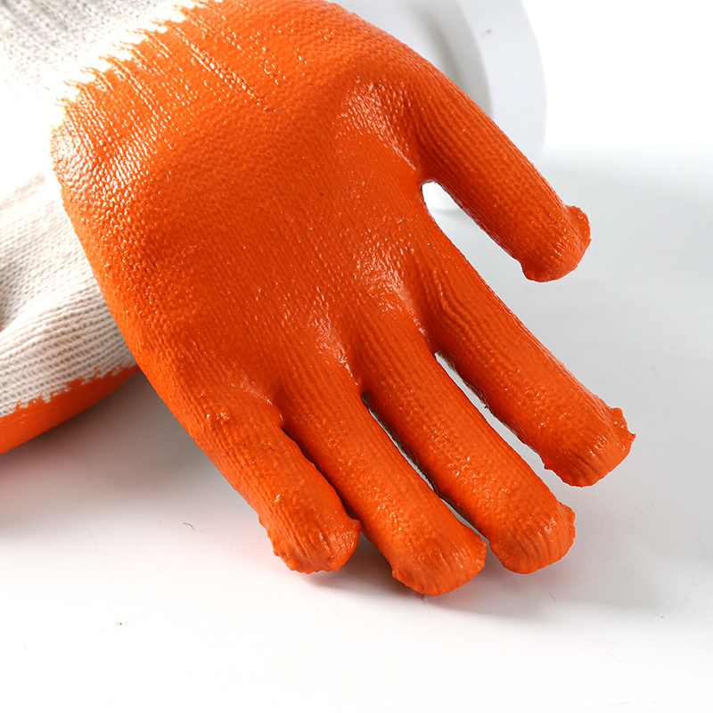                 White cotton with orange latex smooth coating gloves            